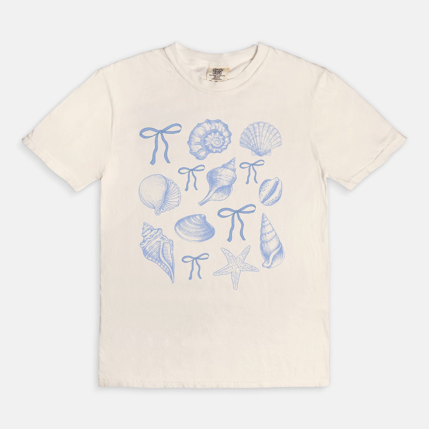 Coquette Seashell Beach Ivory Tee – Coastal Graphic T-Shirt for Women