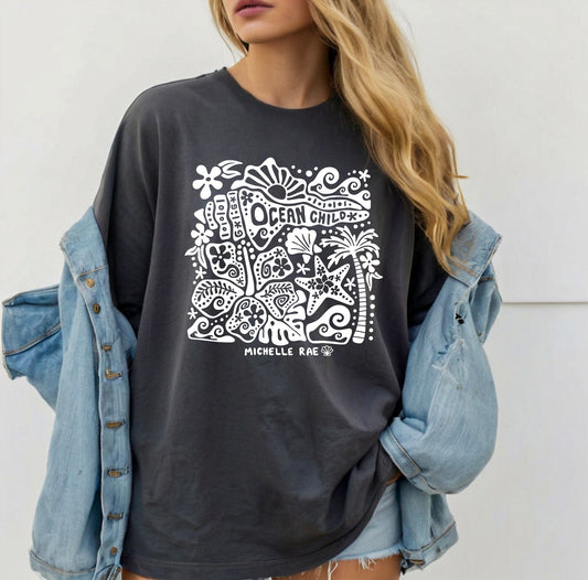 Ocean Child Pepper Tee – Coastal Graphic T-Shirt for Women