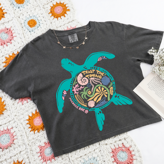 Trust The Timing Pepper Boxy Tee – Inspirational Graphic T-Shirt for Women